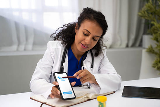 Healthcare clinician using a medical clinic app